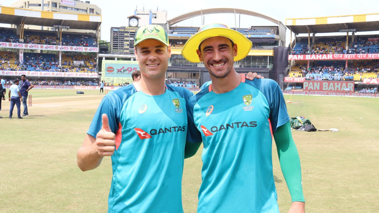 Spencer Johnson with Mitchell Starc